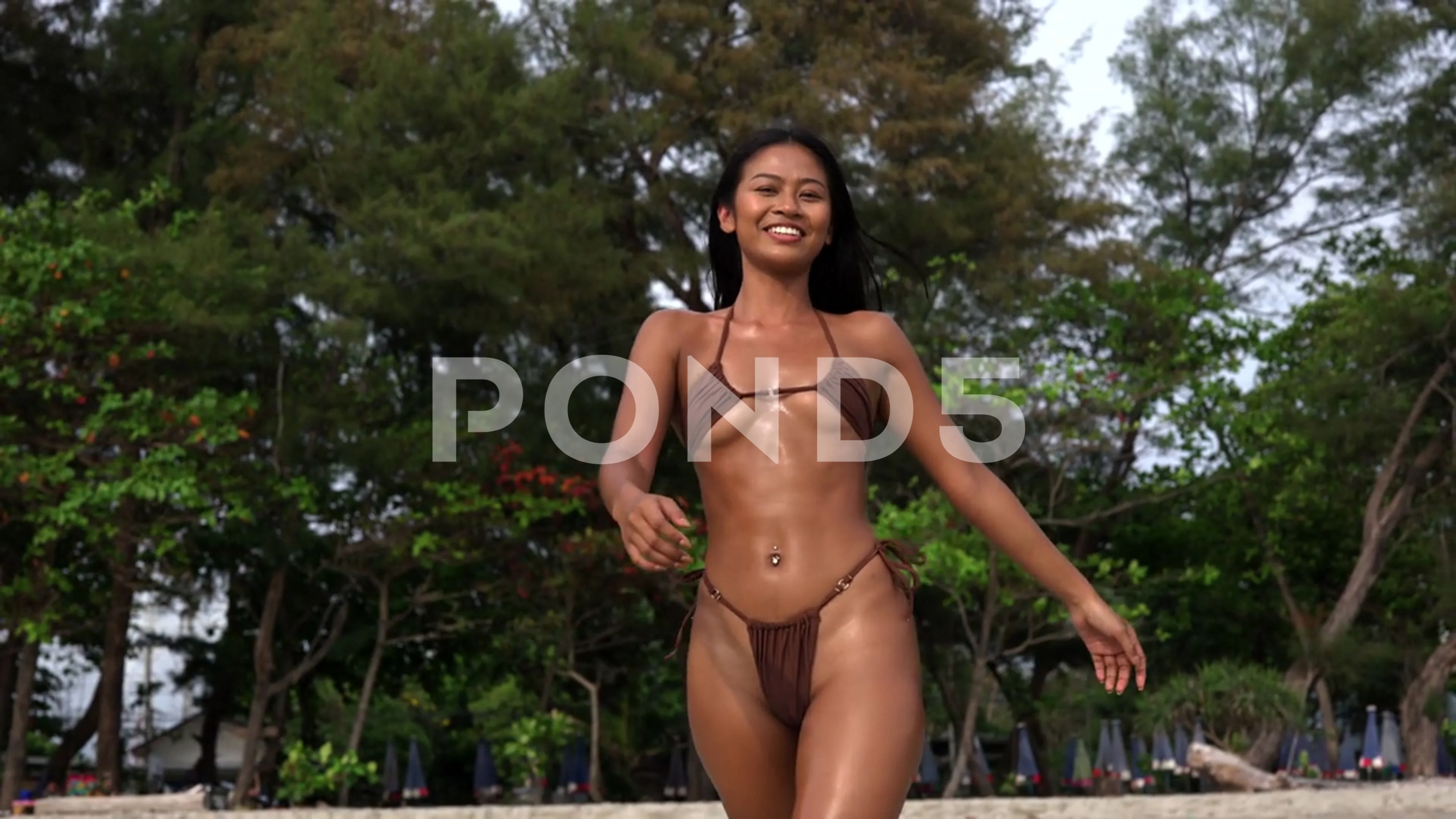 Beautiful Young Woman In Tiny Bikini Wal, Stock Video