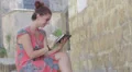 beautiful young woman using a tablet , outdoors HD Footage