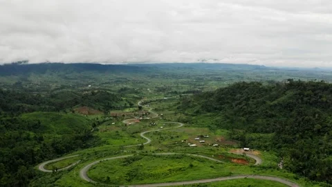 Beautiful zigzag road view on hill in Cambodia. 2K Stock Footage 246104614