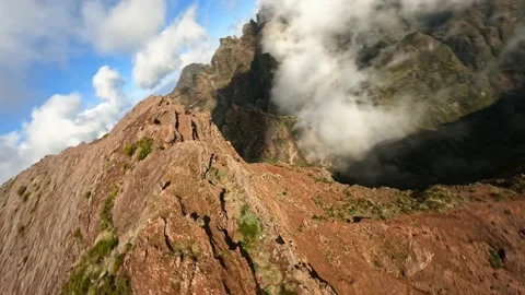 Beautifull mountain surfing FPV drone aerial view, close flying along the Stock Footage