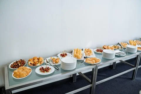 A beautifully arranged table is elegantly set with an array of delicious fo.. Fotos de archivo