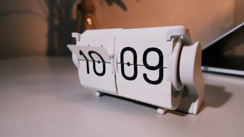 A beautifully crafted desktop flip clock in slow motion. Stock Footage 332035698