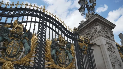Beautifully decorated gate with statues, a column and a lantern. Stock Footage 114986860