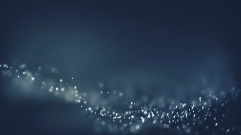 Beautifully floating blue glitter particles with dust on black background in slo Stock Footage 247442584