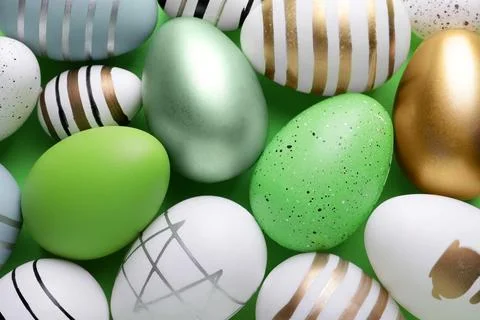 Beautifully painted Easter eggs as background, top view Foto stock