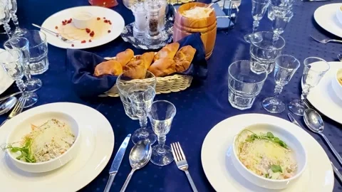 Beautifully set restaurant table inviting guests to enjoy lunch Stock Footage 282288141