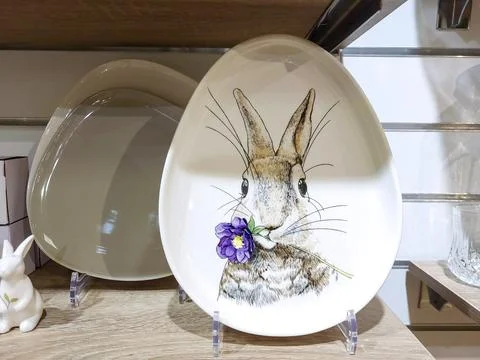 Beautifully set table with decorations for the Easter holiday. A small porcel Stock Photos