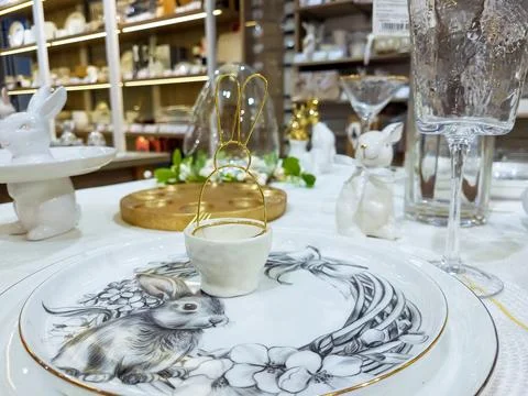 Beautifully set table with decorations for the Easter holiday. A small porcel Stock Photos