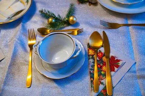 Beautifully set table with elegant decor for a festive Christmas Eve gathering Stock Photos