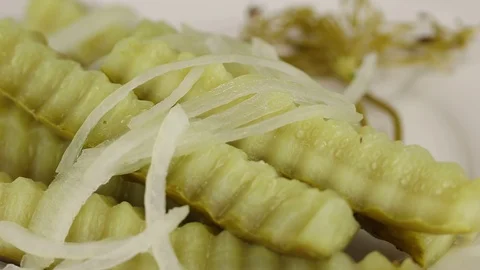 Beautifully sliced fermented cucumbers Stock Footage 121966252