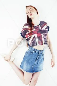 Beauty and skin care. Highly-detailed portrait of attractive redhead teenage Stock Photos