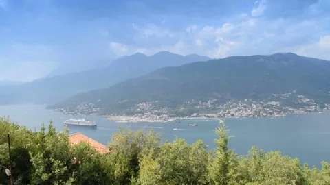 The beauty of the bay and the leaving cruise ship Stock Footage