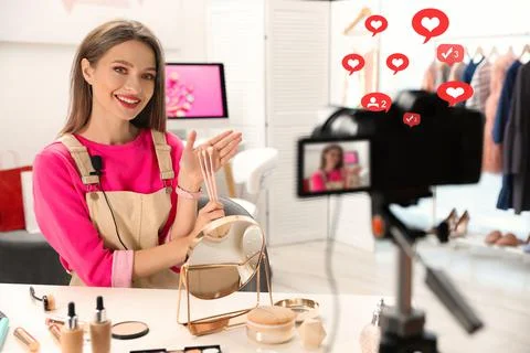 Beauty blogger filming make up tutorial at home Stock Photos