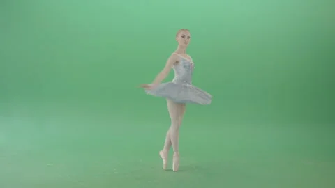 Beauty blonde girl smiling and spinning in ballet dress on green screen Stock Footage 144485389