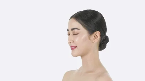 Beauty concept of 4k Resolution. A young Asian woman enjoying a refreshing fa Stock Footage 157688520