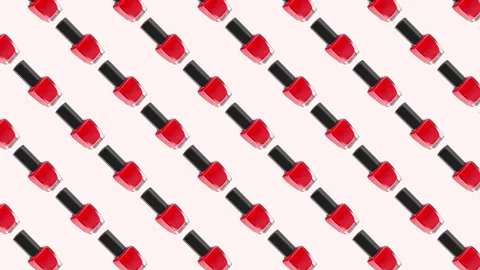 Beauty concept pattern made of nail polishes bottles in same color rotate on Stock Footage 273877751