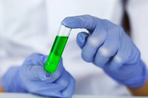 Beauty cosmetics sciences, Formulating and mixing skincare with herbal essence Stock Photos