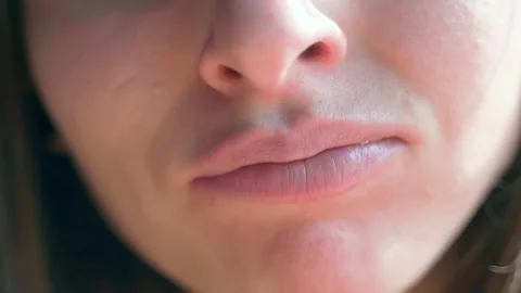 The beauty eats a fresh salad, every bite gives her pleasure, close-up. Video stock 234020666