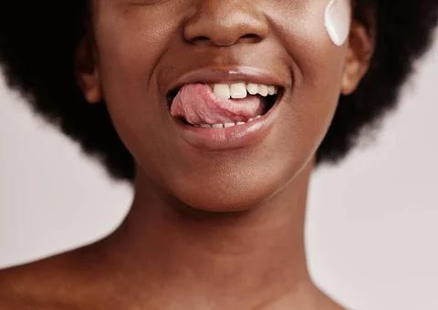 Beauty, face or tongue over teeth in dental care, mouth hygiene or oral we... Stock Photos