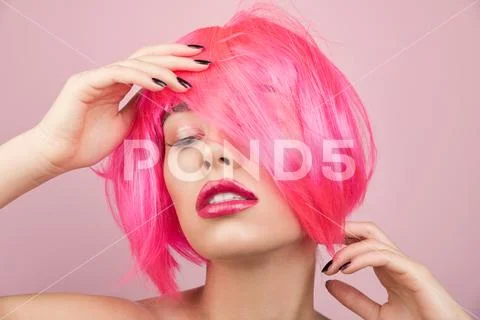 Beauty fashion model with pink hair. Stock Photos