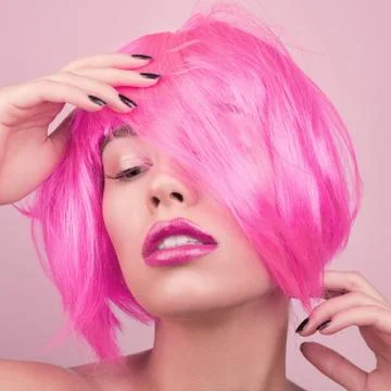 Beauty fashion model with pink hair. Stock Photos