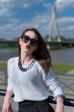 Beauty fashion model posing on city Stock Photos
