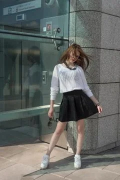 Beauty fashion model posing on city Stock Photos
