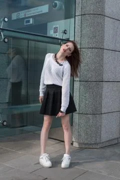 Beauty fashion model posing on city Stock Photos