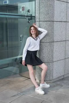 Beauty fashion model posing on city Stock Photos
