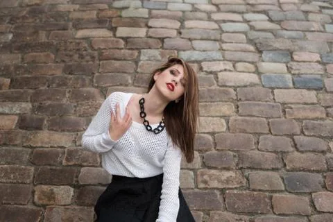 Beauty fashion model posing on city Stock Photos