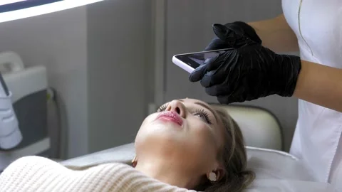 Beauty injections. Lip augmentation procedure. Lip injection. The cosmetologist Stock Footage 239142011