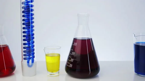 Beauty lab. Glass laboratory flasks are filled with liquid.  Stock Footage 140845950