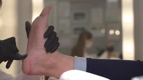 A beauty master does a pedicure Stock Footage 197974474