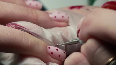 Beauty master doing nails young girl in salon, female beauty and self-care Stock Footage 329030396