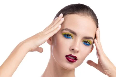 Beauty model holds her head in her hands Stock Photos