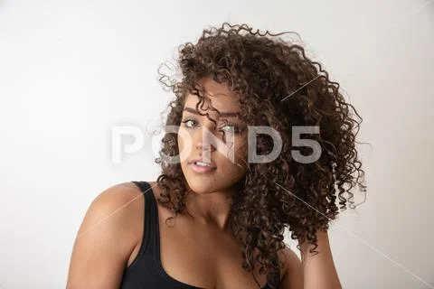 Beauty portrait of african american woman with afro hairstyle and glamour mak Stock Photos