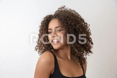 Beauty portrait of african american woman with afro hairstyle and glamour mak Stock Photos