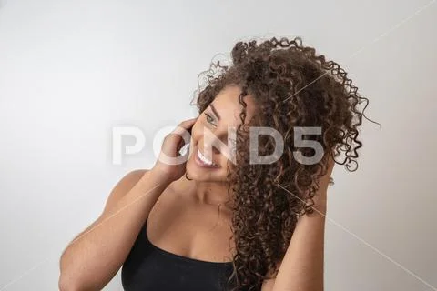 Beauty portrait of african american woman with afro hairstyle and glamour mak Stock Photos