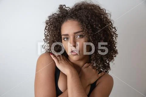 Beauty portrait of african american woman with afro hairstyle and glamour mak Stock Photos