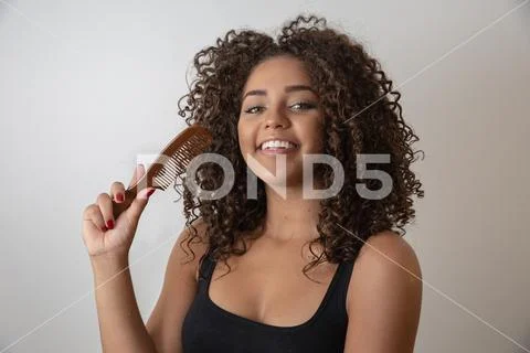 Beauty portrait of african american woman with afro hairstyle and glamour mak Stock Photos