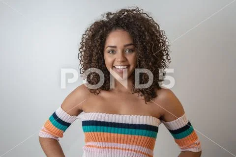 Beauty portrait of african american woman with afro hairstyle and glamour mak Stock Photos