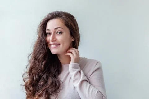 Beauty portrait young happy positive brunette woman on white background isola Stock Photos