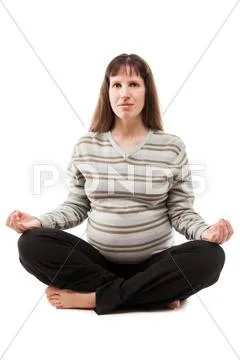 Beauty pregnant woman meditating in yoga exercise Stock Photos