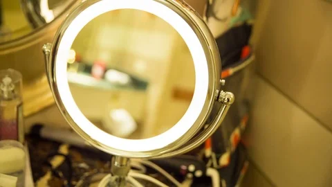 Beauty Ring Light Mirror and Make Up Clutter Stock Footage 79537465