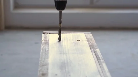 Beauty of slow motion in construction and repair. working with wood - drilling Stock-Footage 107943845