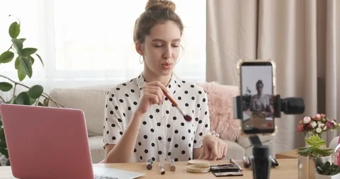 Beauty vlogger recording make up tutorial Stock Footage 107307788