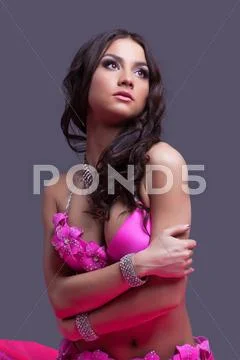 Beauty woman dancer portrait in pink costume Stock Photos