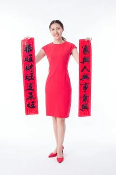 Beauty woman show couplets with chinese new year Stock Photos