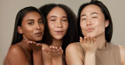 Beauty, women or friends blow kiss in studio for diversity, inclusion and Stock Photos