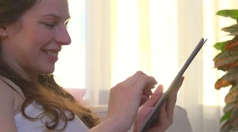 Beauty young woman using PC Tablet. Stockbeeldmateriaal 59087057